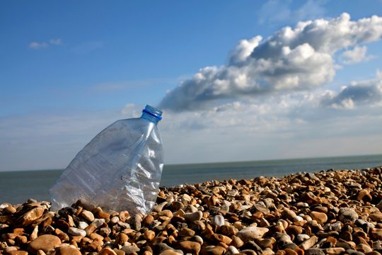 Bottle on beach climate change GettyImages-467434285.jpg