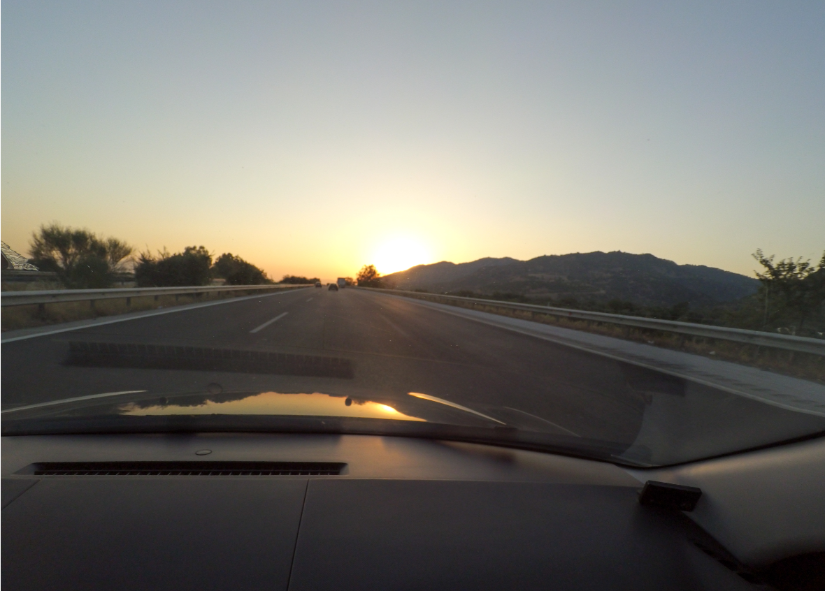 driving towards the sunset