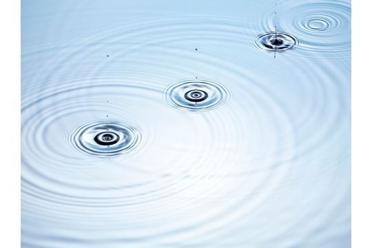 Three drops of water falling into a pool of water.jpg